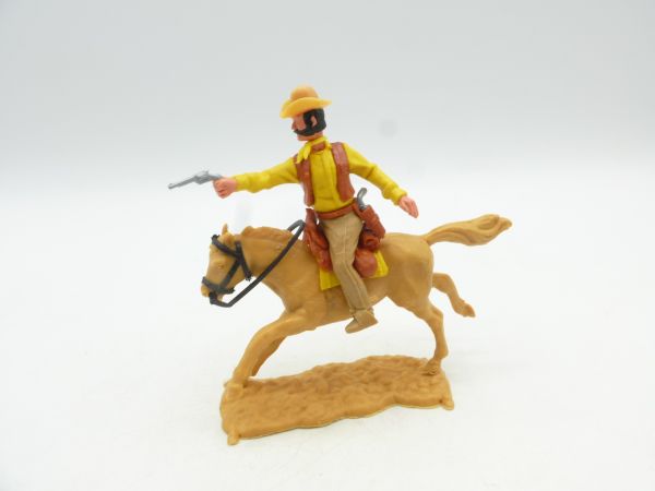 Timpo Toys Cowboy 3. Version zu Pferd, Pistole schießend