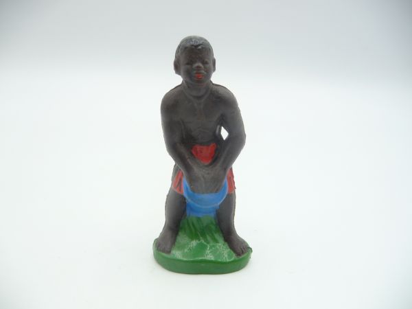 African with drum, red loincloth, blue drum
