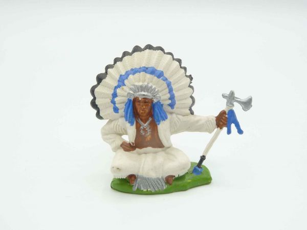 Britains Swoppets Chief sitting with tomahawk, feathers with blue