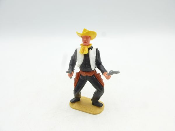 Timpo Toys Cowboy standing with 2 pistols, yellow hat