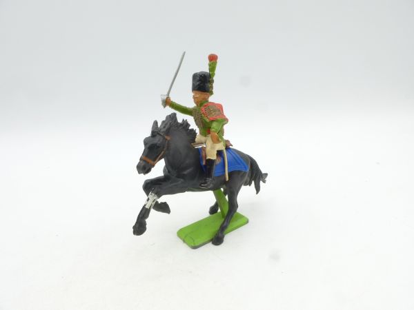 Britains Deetail Waterloo soldier riding, sabre raised sideways