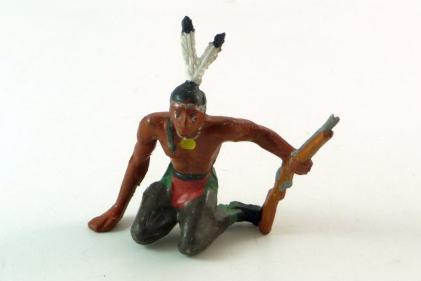 Merten Indian kneeling with rifle