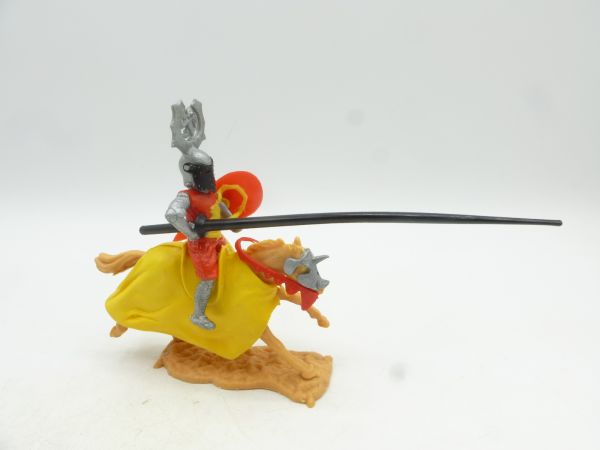 Timpo Toys Tournament knight riding, red/yellow with black lance