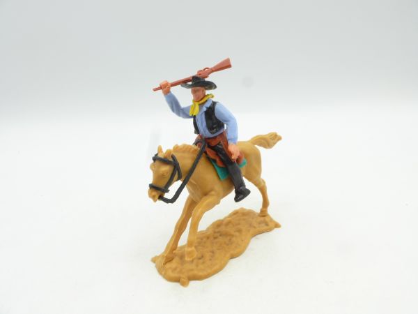 Timpo Toys Cowboy mounted striking with rifle