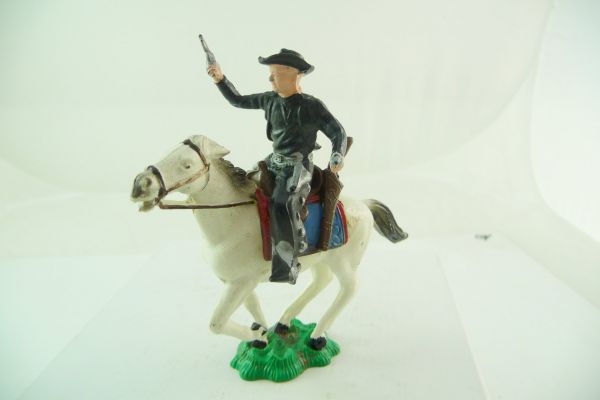 Reisler Hartplastik Cowboy reitend mit 2 Pistolen - seltene Figur