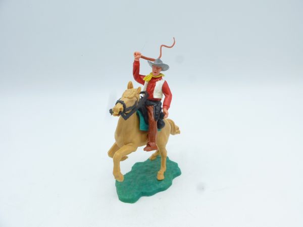 Timpo Toys Cowboy 2. Version reitend mit Peitsche