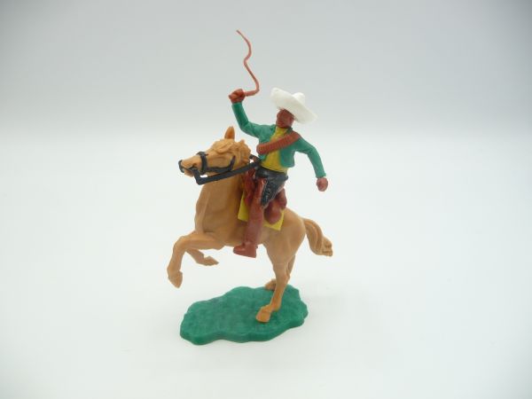 Timpo Toys Mexican riding, green/yellow, brown belt with whip
