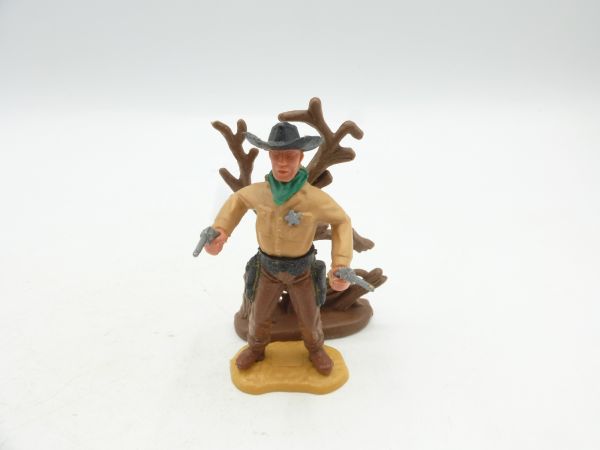 Timpo Toys Sheriff standing in front of tree, shooting 2 pistols