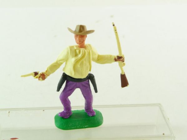 Timpo Toys Cowboy mit Gewehr und Pistole, hellgelb - sehr guter Zustand