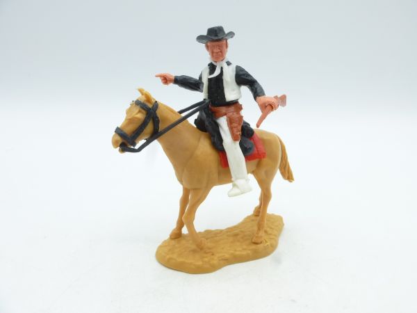 Timpo Toys Cowboy auf gehendem Pferd - tolle Figur, tolle Farbkombi