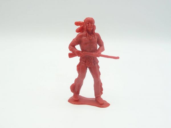 Heinerle Domplast Manurba Indian with rifle in front of the body, deep red