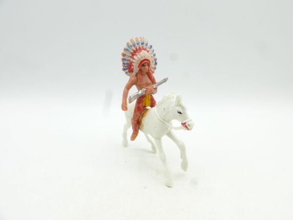 Jackson Indian riding, rifle in front of the body - see photo