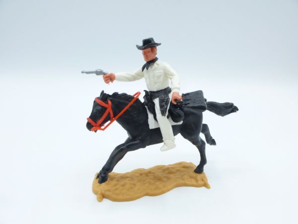 Timpo Toys Cowboy reitend, weiß mit schwarzen Holstern + Accessoires