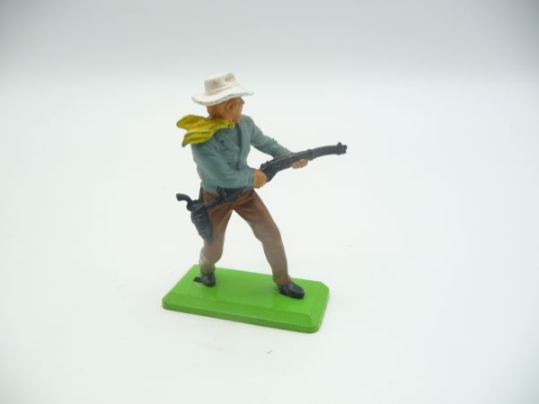 Britains Deetail Cowboy standing, firing rifle from the hip