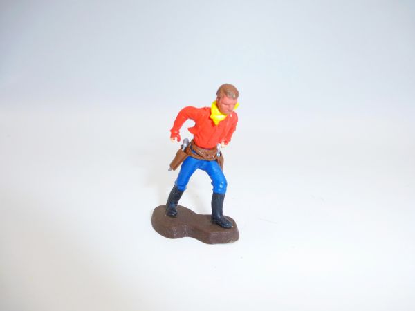 Britains Swoppets Cowboy in duel, both hands pulling pistol (red shirt)