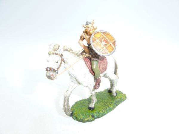 Viking on horseback with shield