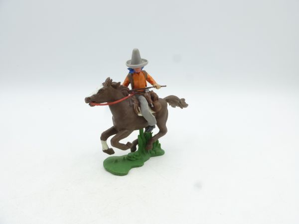 Britains Swoppets Cowboy with Stetson, rifle in front of his body (with 3 weapons)