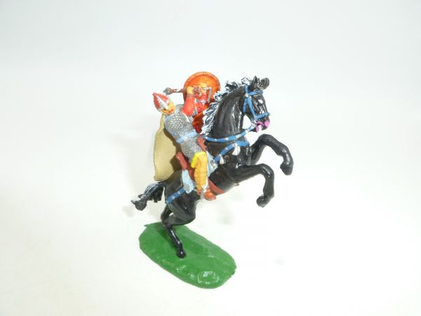 Norman on horseback (rearing) with mace + cape