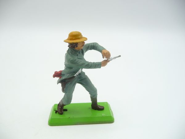 Britains Deetail Cowboy holding / firing pistol with both hands (blue-green)