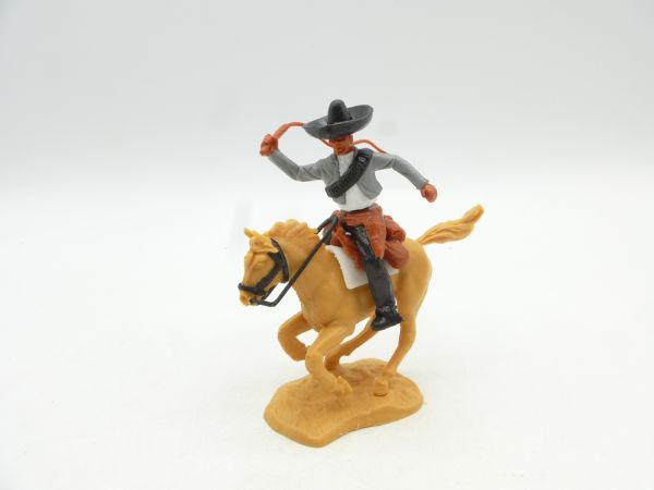 Timpo Toys Mexican riding with whip, grey/white