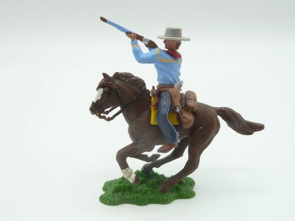 Britains Swoppets Cowboy riding, firing with rifle + 2 pistols