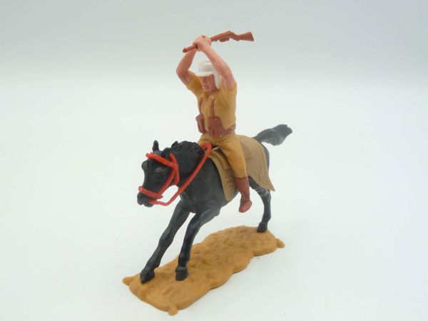 Timpo Toys Foreign Legionnaire riding with rifle over his head