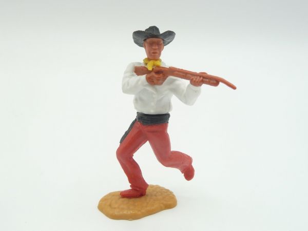 Timpo Toys Cowboy 2. Version laufend auf seltenem roten Unterteil