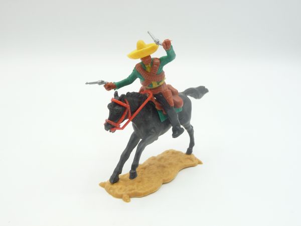 Timpo Toys Mexican riding, firing wild with 2 pistols, green/yellow