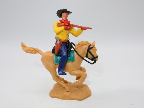 Timpo Toys Cowboy 3. Version reitend mit kurzem Gewehr
