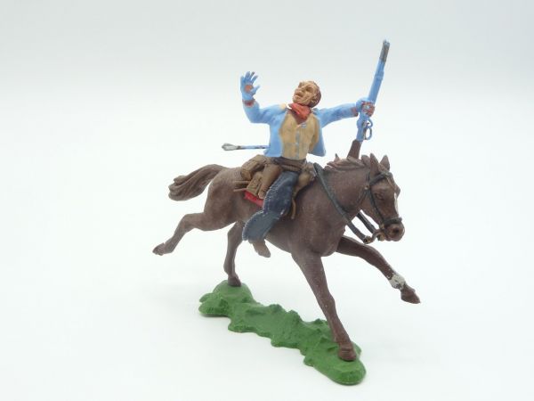 Britains Swoppets Cowboy riding, hit by arrow, light-blue jacket
