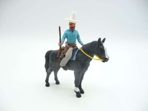 Britains Swoppets Cowboy on horseback (standing) with rifle