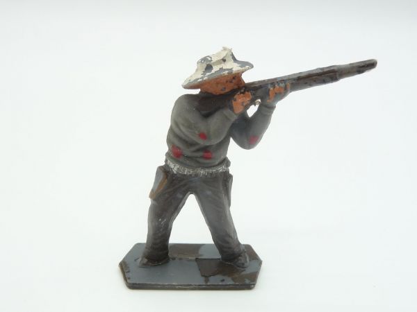 Lone Star Cowboy firing with rifle