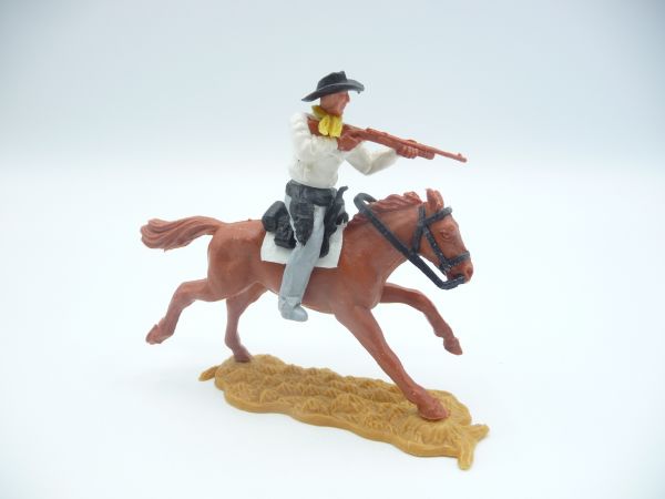 Timpo Toys Cowboy 2nd version riding, firing rifle - nice combination