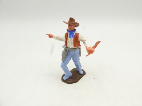 Timpo Toys Cowboy 2nd version with rifle sideways, pointing