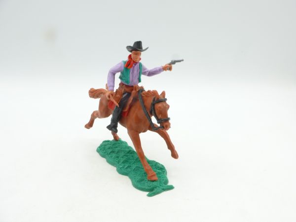Timpo Toys Cowboy 2. Version reitend mit Pistole + Gewehr