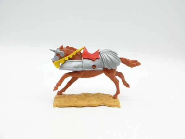 Timpo Toys Armoured horse, medium brown, long walking, red saddle
