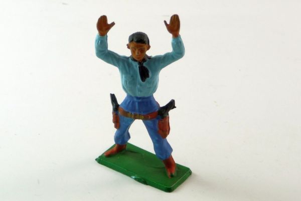 Starlux Cowboy standing with raised hands