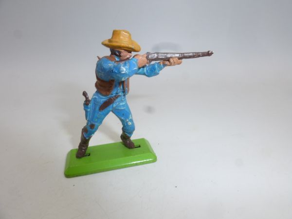Britains Deetail Cowboy standing, shooting rifle sideways