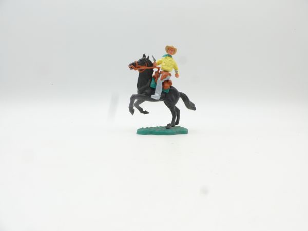 Timpo Toys Cowboy 2nd version riding, shooting 2 pistols - great lower part