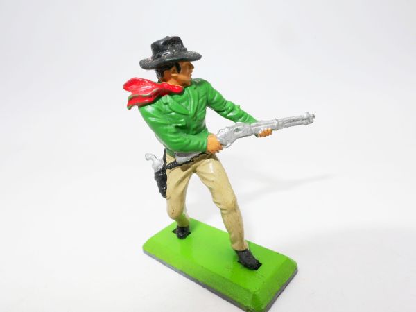 Britains Deetail Cowboy shooting from the hip, green shirt