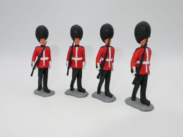 Timpo Toys 4 Guardsmen walking, rifle sideways