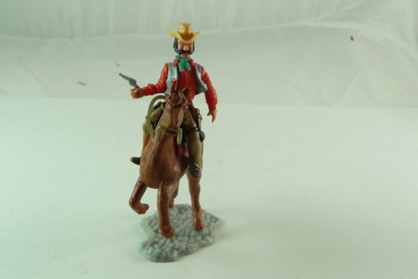 Timpo Toys Cowboy 4. Version reitend, silber/rot, Pistole schießend