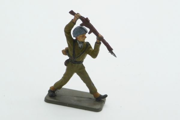 Crescent American soldier, jabbing with rifle from above