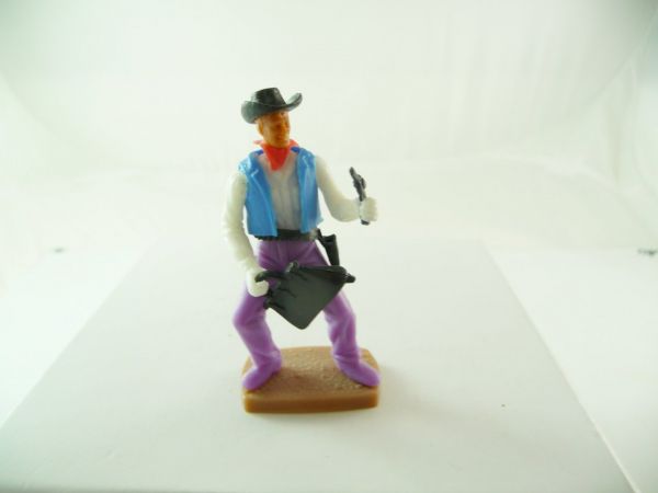 Plasty Cowboy crouching with money bag + pistol