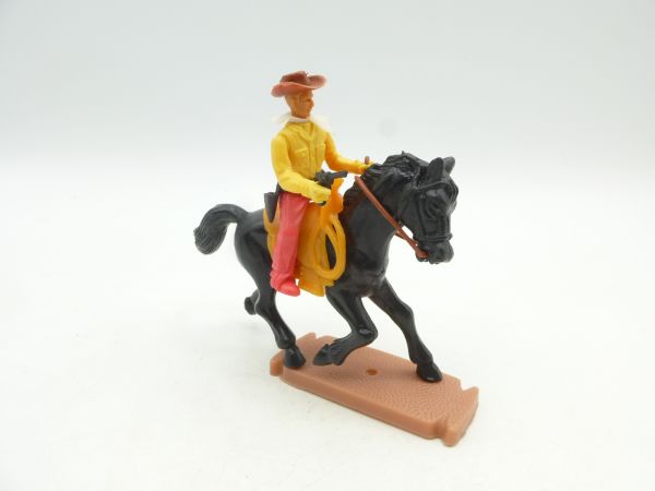 Plasty Cowboy riding with pistol