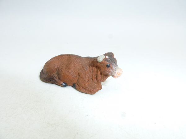 Cow lying, height approx. 2 cm - used