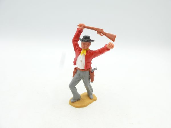 Timpo Toys Cowboy 3. version advancing, striking with rifle
