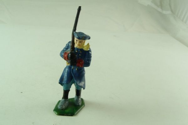 Marx Revolution soldier marching, rifle shouldered