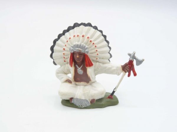 Britains Swoppets Chief sitting with tomahawk, feathers with red