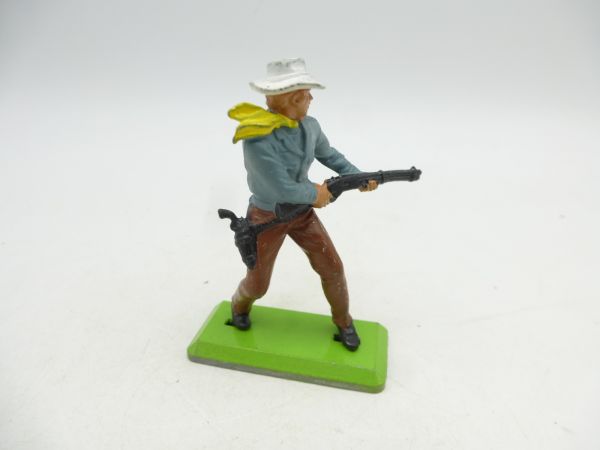 Britains Deetail Cowboy, shooting rifle from hip, grey-blue